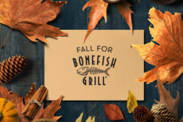 Fall for bonefish flat lay with autumn leaves and pinecones