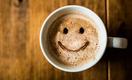 coffee cup with smile in foam