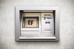 valley bank atm with eraser farm logo on the screen